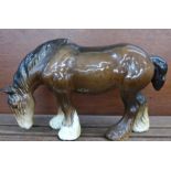 A Beswick model 1050 grazing shire horse,