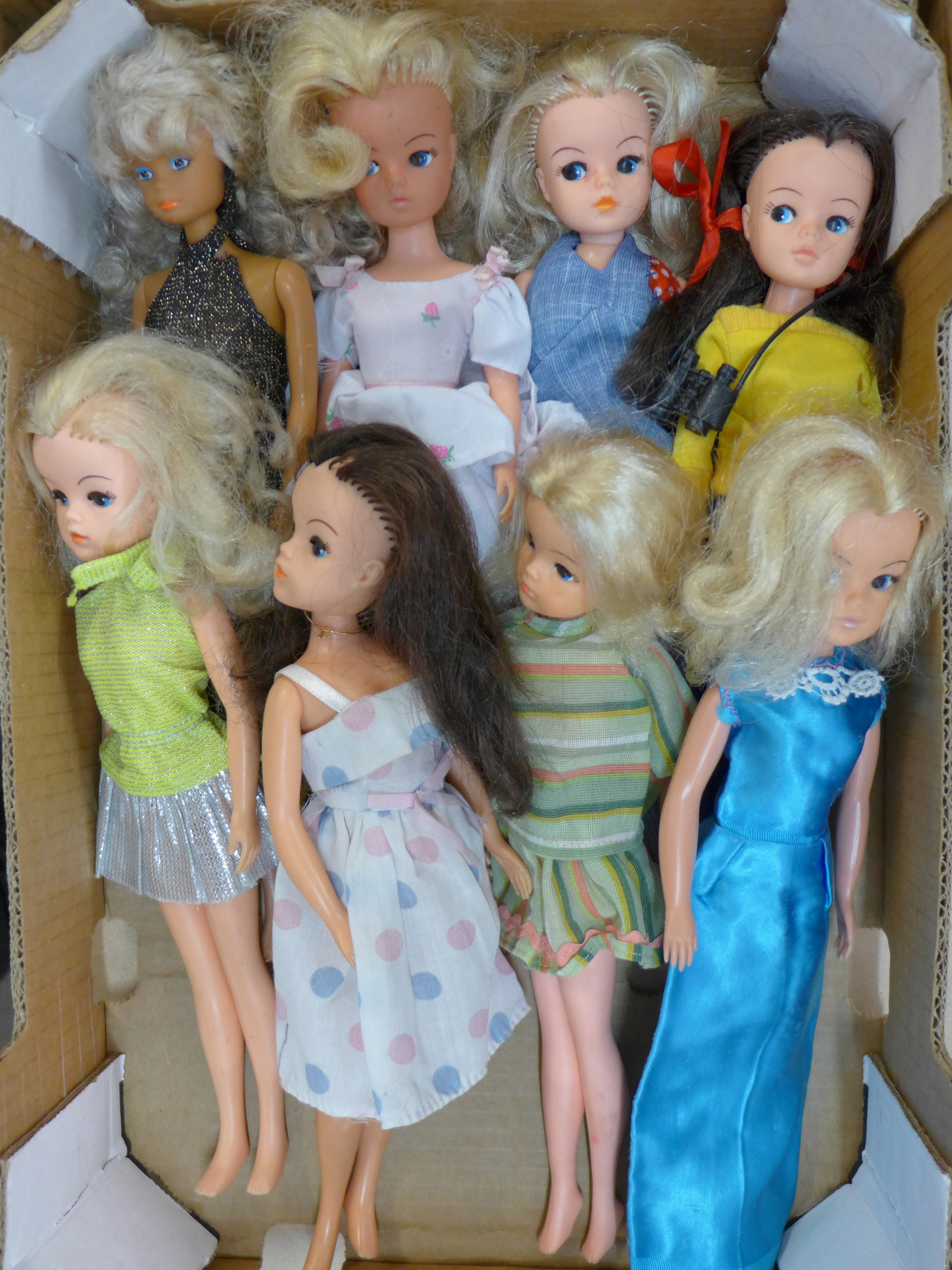 Seven Sindy dolls,
