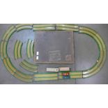 A tin-plate speedway set,