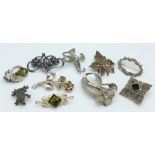 Ten silver brooches