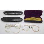 Two pairs of rolled gold spectacles and three cases