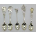 A collection of silver spoons including RAF and shooting,