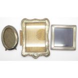 Three silver photograph frames