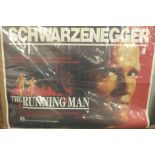 Two Arnold Schwarzenegger film posters;