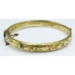 A silver gilt bangle