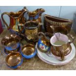 A collection of lustre jugs, cups, saucer, plates, etc.