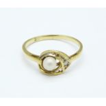 A 9ct gold, pearl and white stone ring, 1.