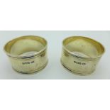 A pair of silver napkin rings, 60.