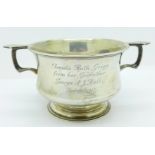 A silver porringer, Asprey, London, 289g,