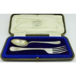 A cased silver Christening set,