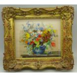 A gilt framed floral display silkwork,