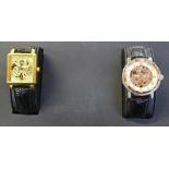 Two dress wristwatches on presentation tray