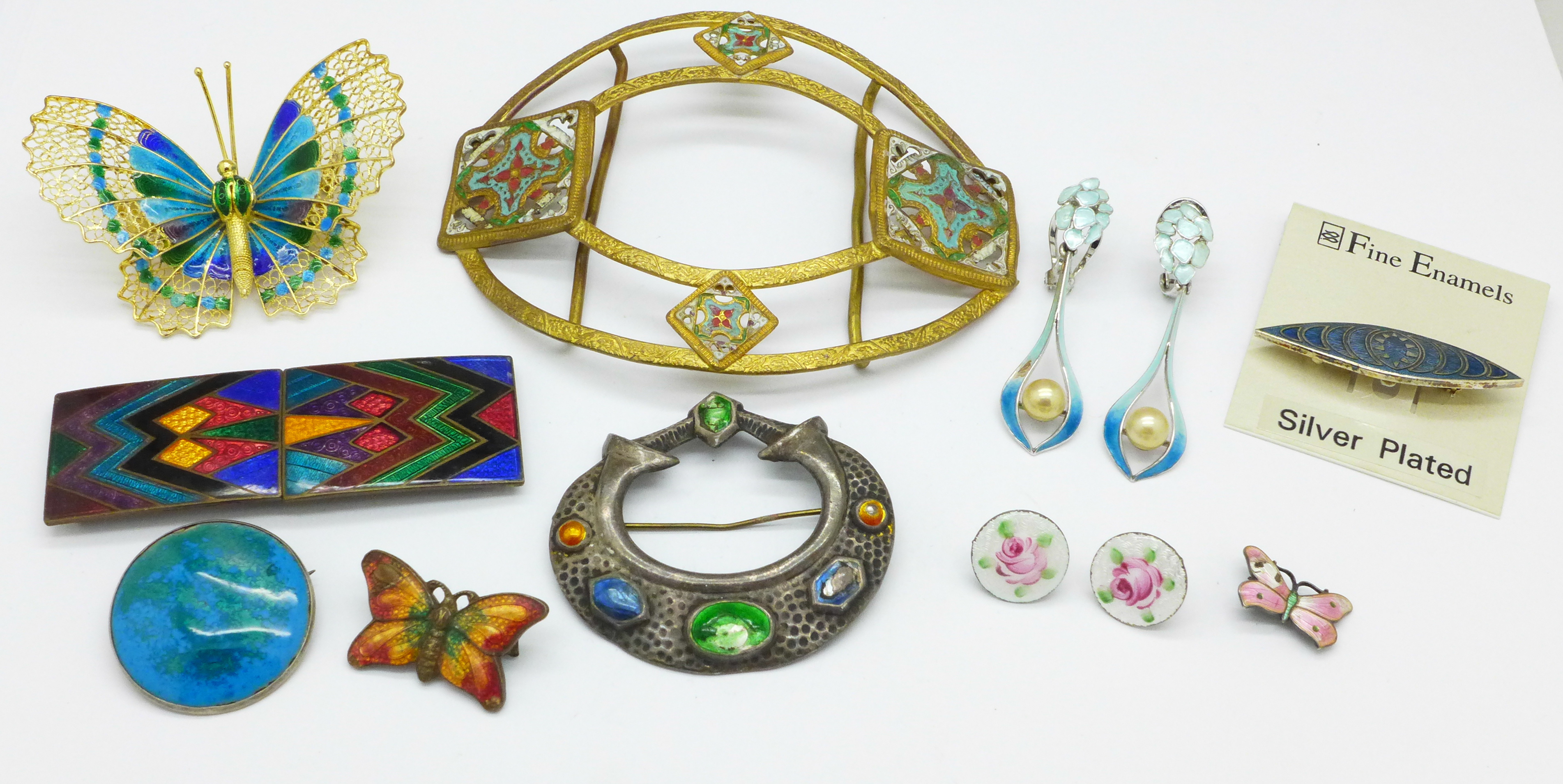Enamel jewellery and two buckles,