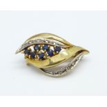 A 9ct gold, diamond and sapphire brooch, 3.