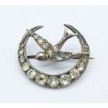 A hallmarked silver and paste set bird brooch,