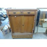 A 19th Century French pitch pine kitchen cupboard