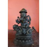 An oriental bronze deity