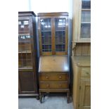 An oak bureau bookcase