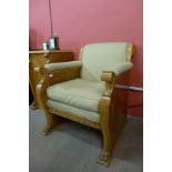 An Art Deco Beidermeier birds eye maple armchair