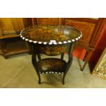 A blackwood and marquetry inlaid lady's oval dressing table,