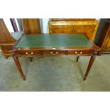 A mahogany three drawer writing table