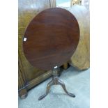 A Victorian mahogany circular tilt-top tripod table