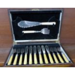 A cased set of fish knives and forks,