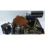 Three cameras, a Coronet Flashmaster, a Kodak Duaflex II,