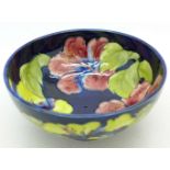 A Moorcroft hibiscus bowl, diameter 15.