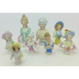 A collection of eight half dolls,