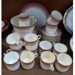 A twelve setting tea service, one cup a/f, some staining,