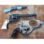 Three toy guns including Lone Star The Cheyenne and Range Rider Mk III