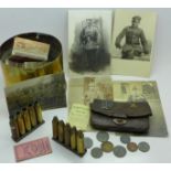 A military shell case marked 1915, other shell cases,