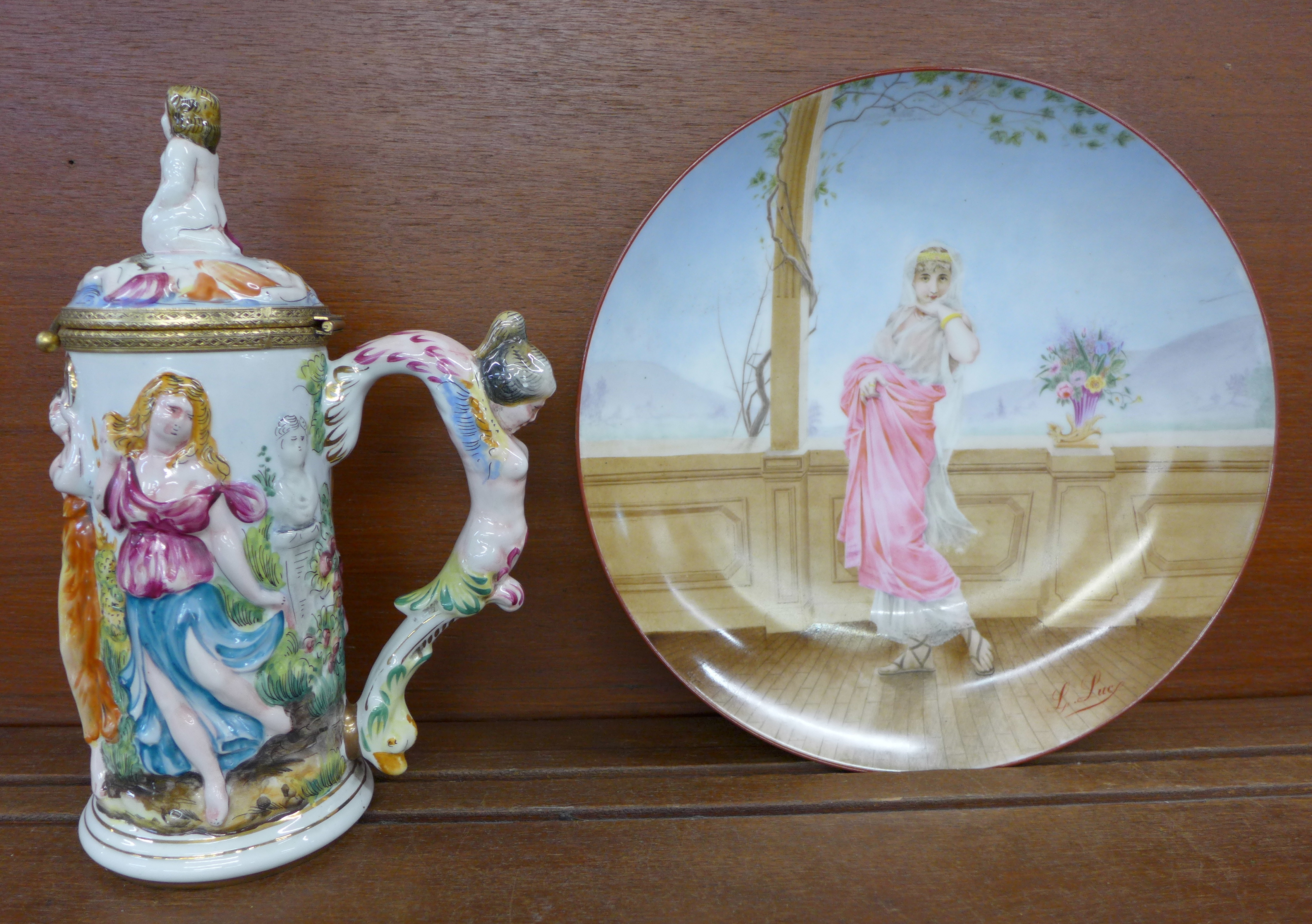 A French hand painted porcelain charger and a Naples porcelain tankard,