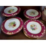 A continental hand painted dessert service, comprising six 23cm plates,