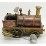 A model Birmingham Dribbler or Piddler copper steam engine