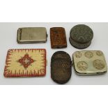 A matchbook case, coin holder, trinket box, etc.