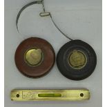 Two steel tape measures,