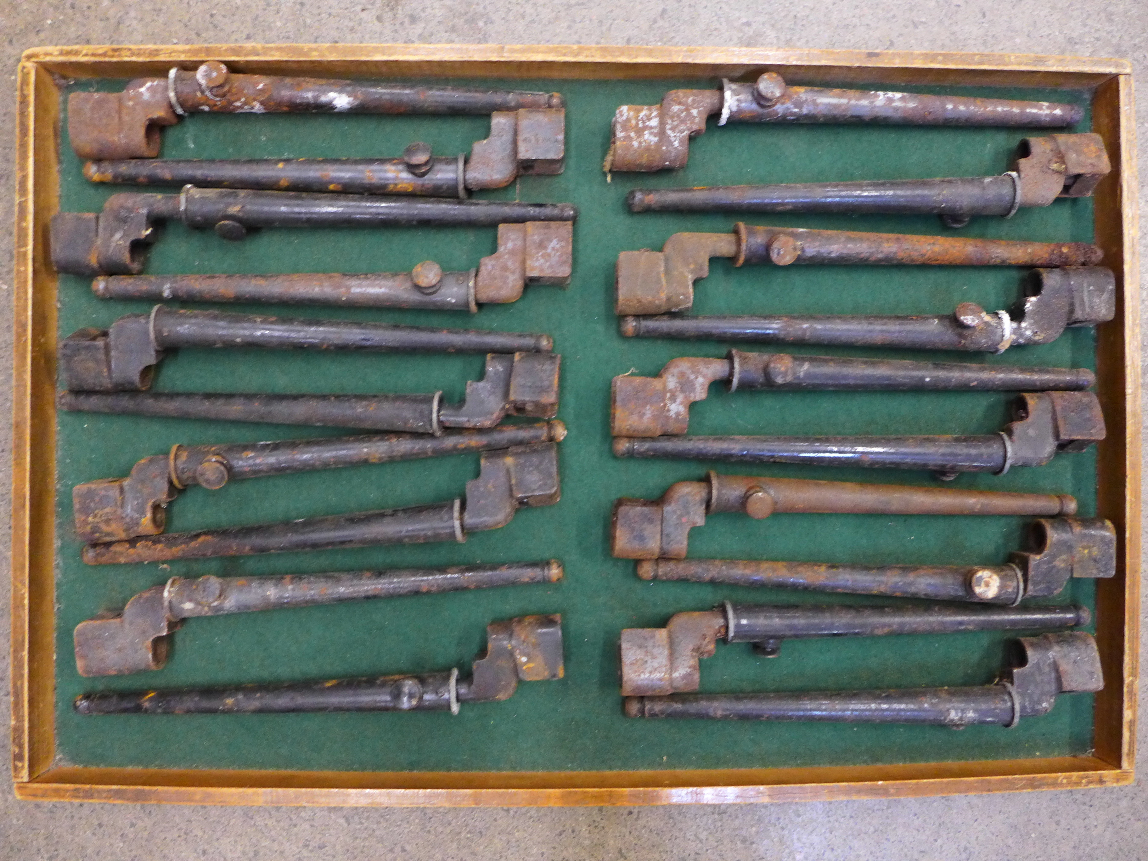 Twenty socket/spike bayonets and scabbards