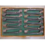 Twenty socket/spike bayonets and scabbards