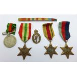 A set of four WWII medals and a SA badge to M23415 P.