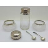 Two silver rimmed glass salts,