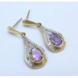 A pair of amethyst and diamond earrings, 1.