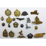 Assorted cap badges including Air Gunner S/A Bomber Squadron, Australian Tank Corps,