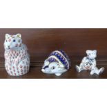 Three Royal Crown Derby paperweights, hamster with silver stopper,