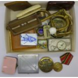 A perpetual brass desk calendar, curtain tie-backs, cigarette cases, etc.