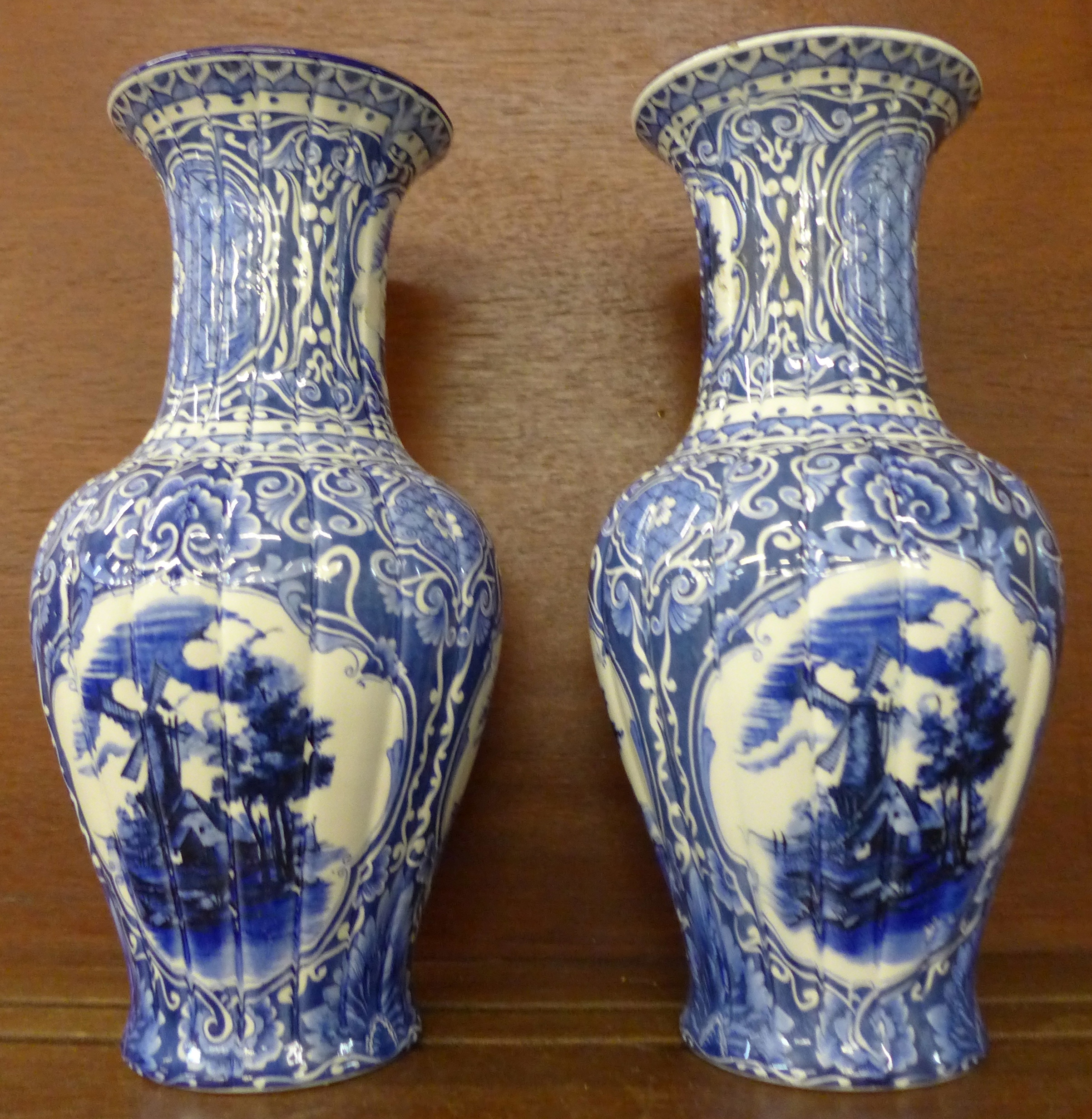 A pair of blue and white vases, one base marked C. - Image 2 of 3