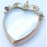 A 9ct gold heart shaped red stone set picture locket, 1.