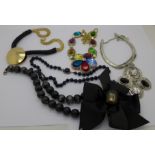 Two Butler and Wilson designer necklaces, boxed, and three other necklaces,