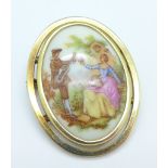 A yellow metal brooch with oval Limoges picture plaque (tests as 9ct gold), 9g gross,